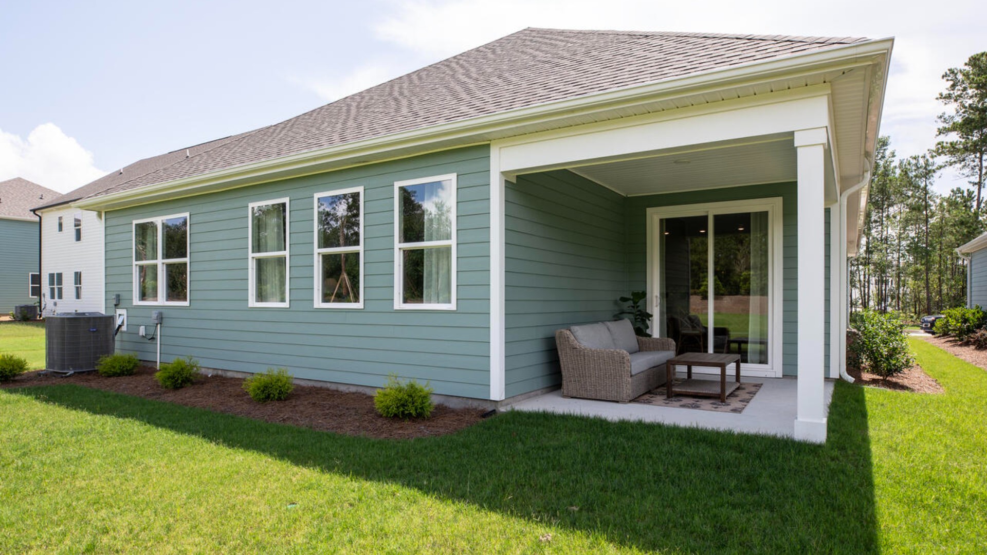 a cozy screened in patio and a covered front porch!