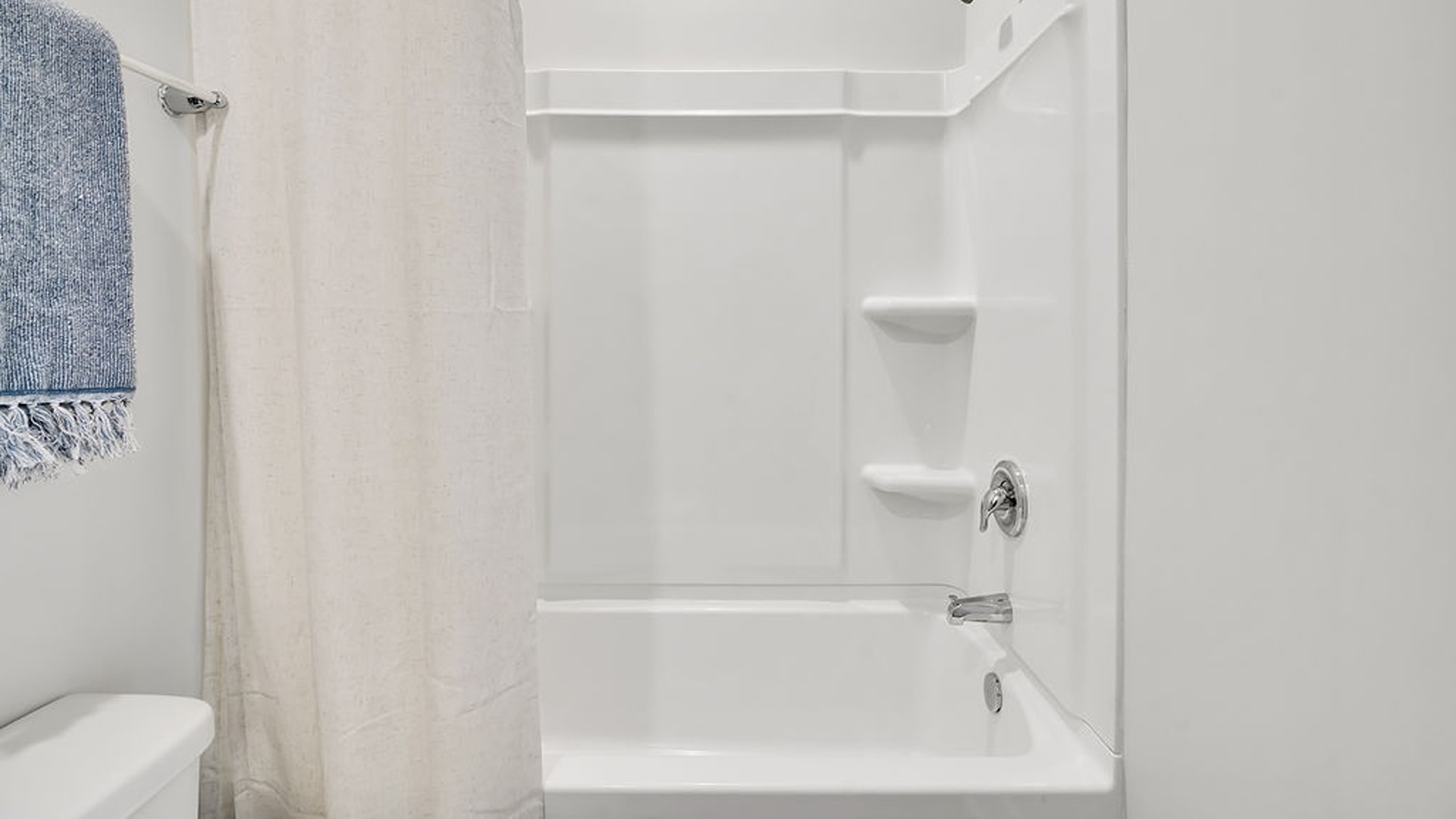 Your primary suite features a 5-foot tiled shower with a frameless glass door and dual vanities for a touch of everyday luxury. This beautiful homesite backs up to a tree line and is on a street that ends in a cul-de-sac.