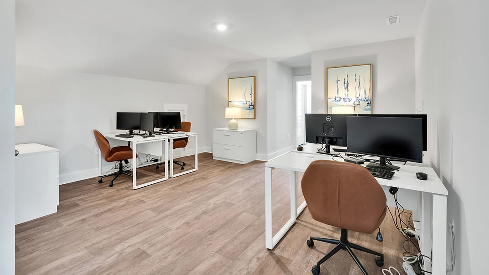 a bonus room and additional bedroom upstairs with oak tread stairs.