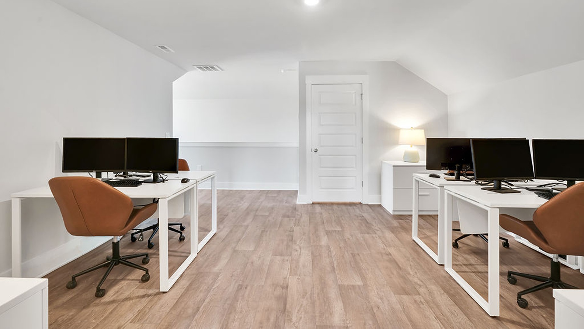 a bonus room and additional bedroom upstairs with oak tread stairs.