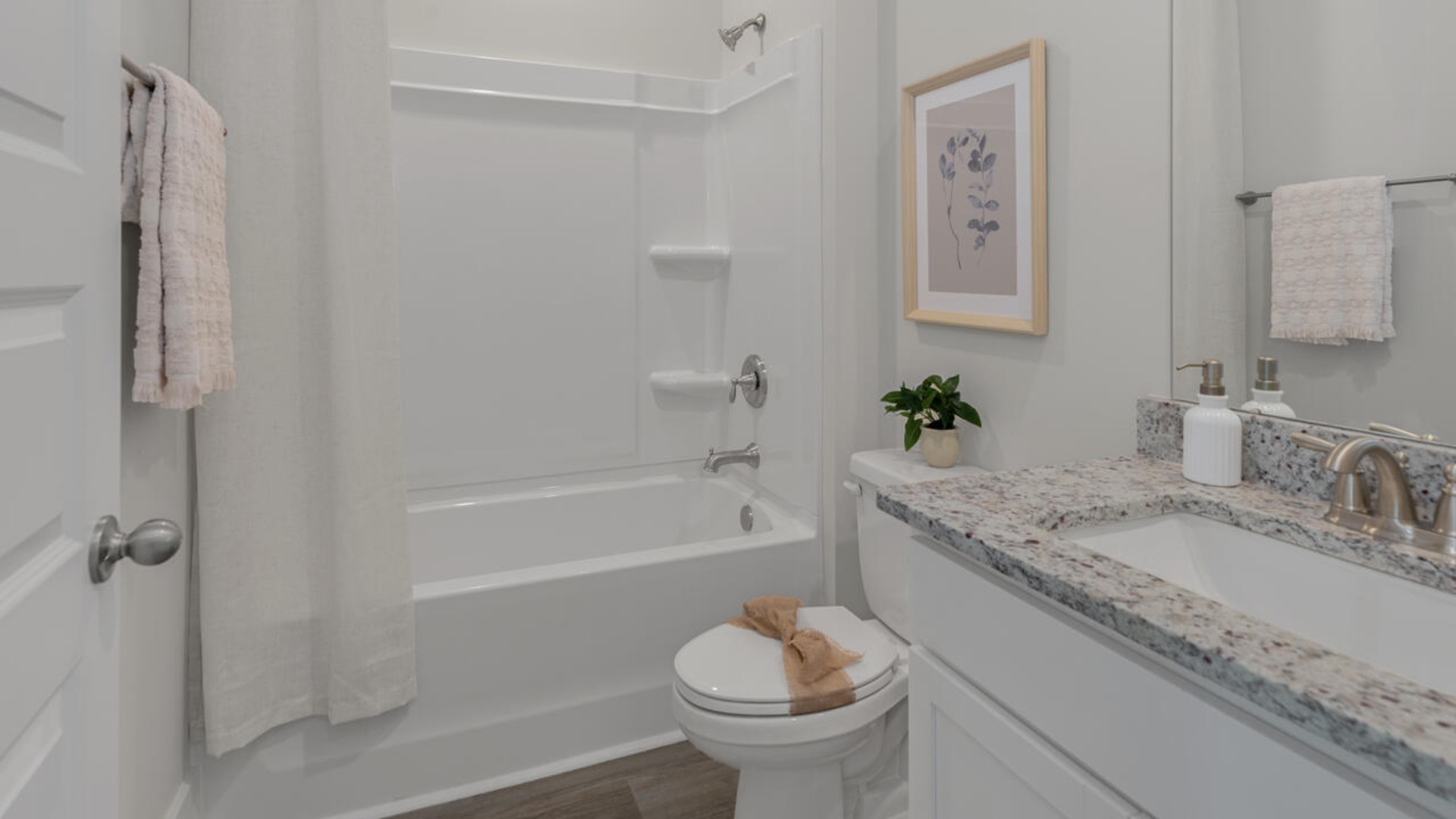 On the first floor you will also find three secondary bedrooms, two full baths, and a three-car garage. Enjoy the covered porch perfect for entertaining and enjoying the Carolina evenings. Ask about our Multi-Gen and 2nd floor options.