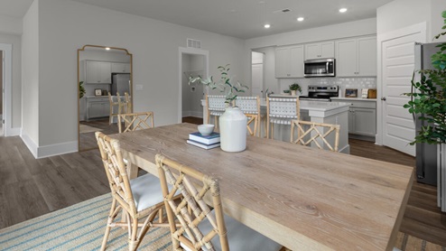 This open concept home features 9 ft. ceilings, granite kitchen counter tops, walk-in pantry, over-sized kitchen island, ample storage space, and cultured marble countertops in the bathrooms.