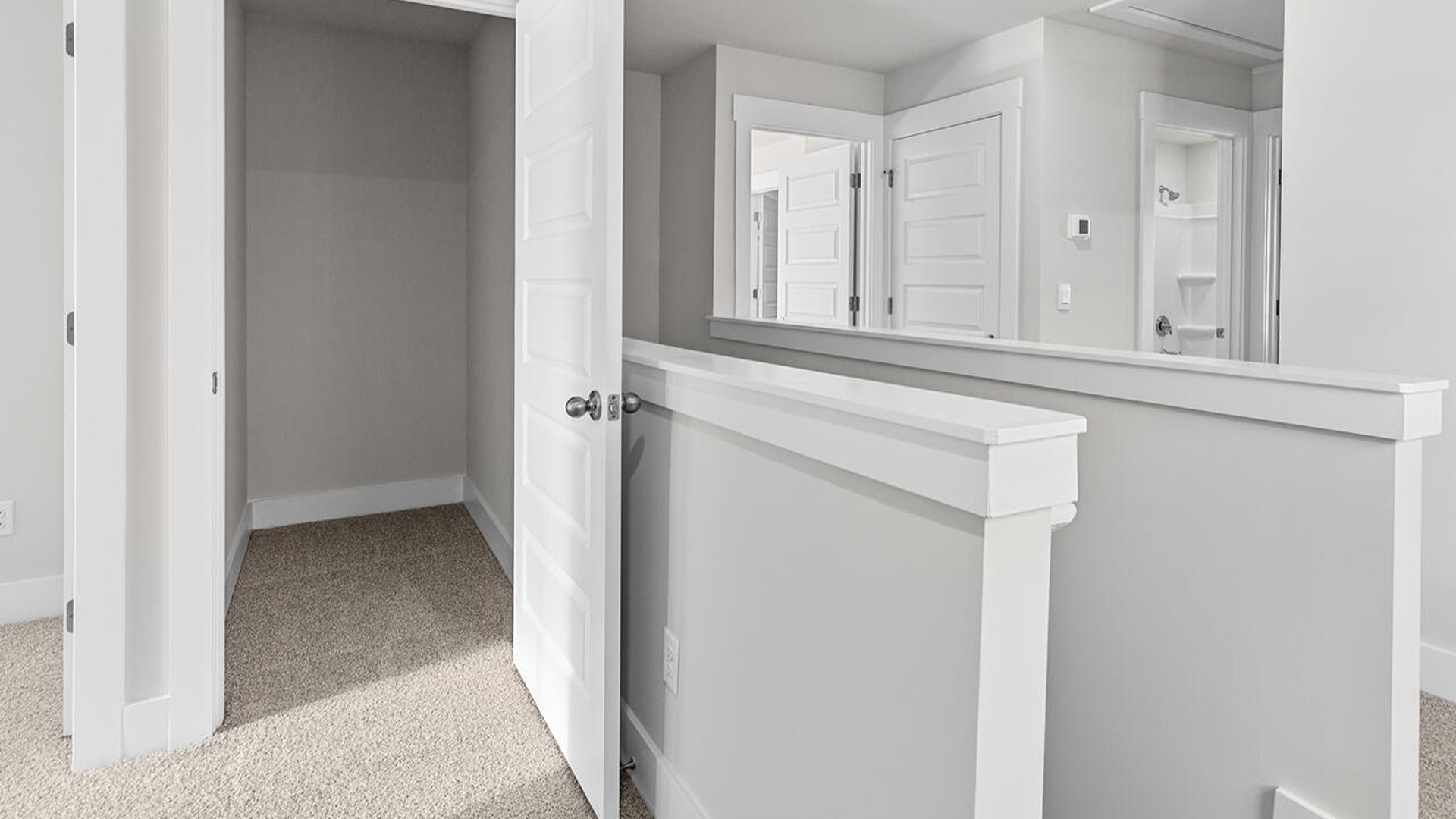 The primary bedroom has its own attached bathroom that features a walk-in closet and all the space you need to get ready in the morning.