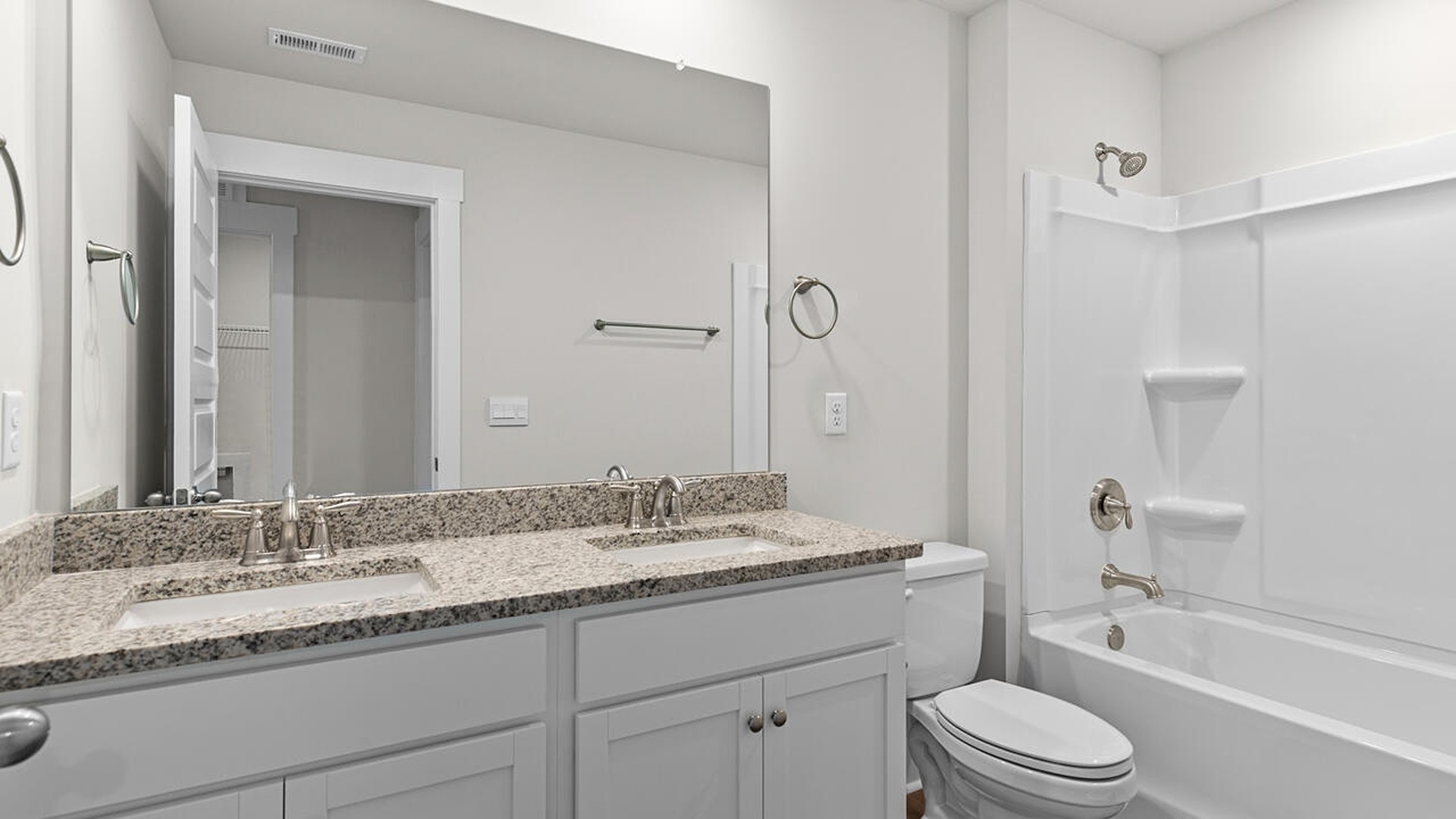 The primary bedroom has its own attached bathroom that features a walk-in closet and all the space you need to get ready in the morning. Sharing a sink isn’t a worry with the double vanity, and you also get additional privacy with a separate door for the toilet and shower. On the second floor there are an additional 3 bedrooms, 2 baths and laundry room.