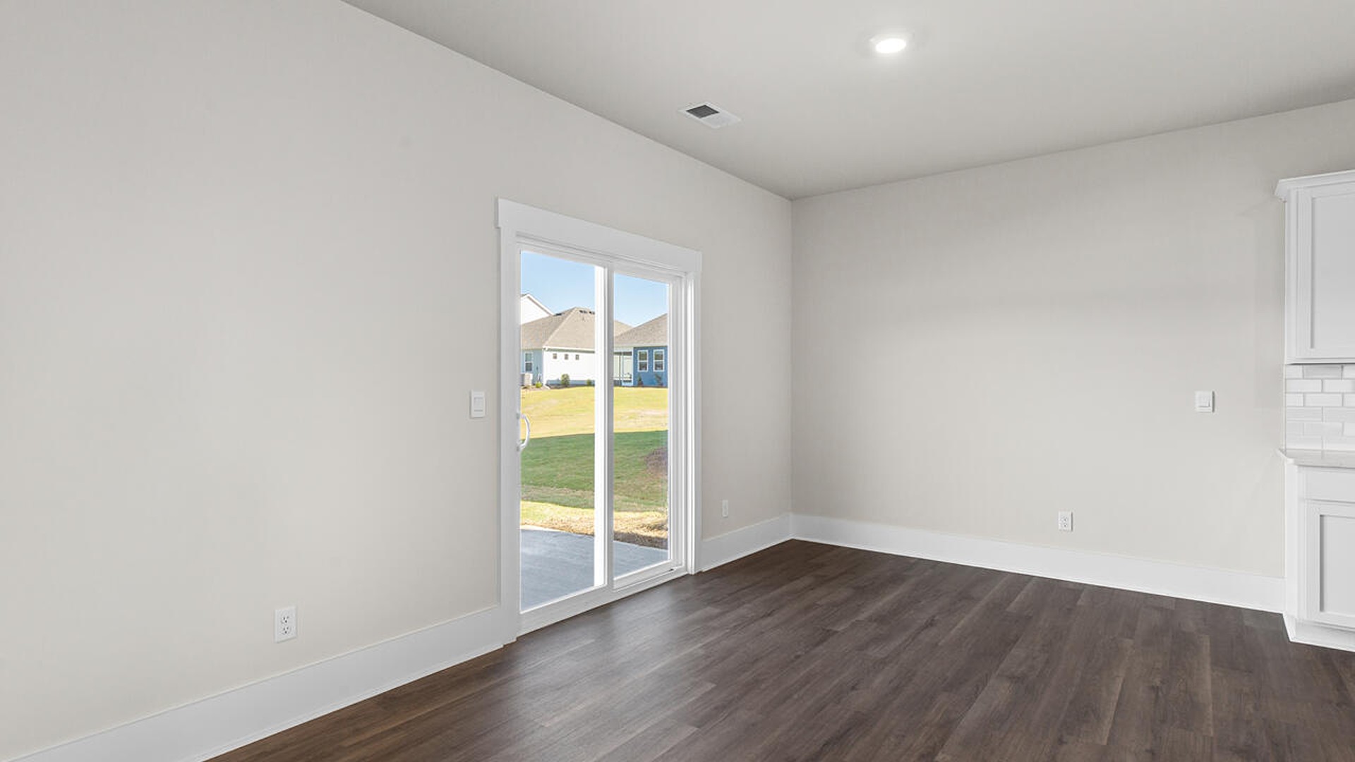 This new home features 9 ft. ceilings, beautiful quartz kitchen countertops, granite countertops in the two full bathrooms, luxury vinyl plank flooring throughout the first floor of the home, and a cozy screen porch!