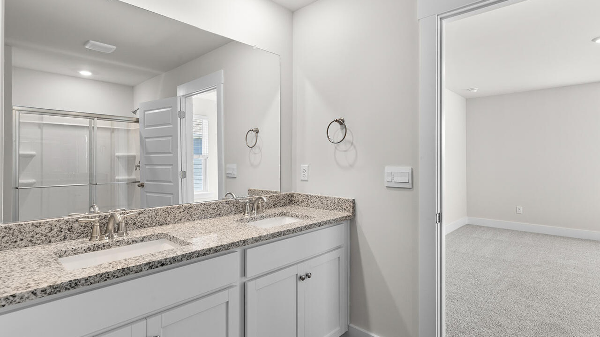 The primary bedroom has its own attached bathroom that features a walk-in closet and all the space you need to get ready in the morning. Sharing a sink isn’t a worry with the double vanity, and you also get additional privacy with a separate door for the toilet and shower.