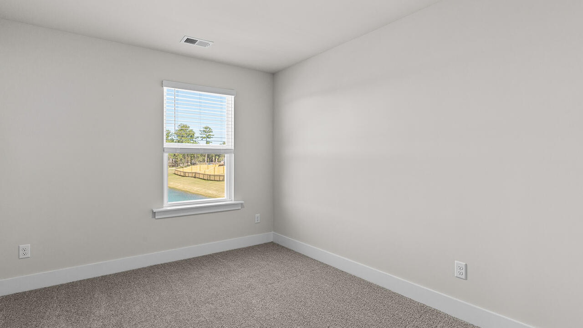 This new home features 9 ft. ceilings, beautiful quartz kitchen countertops, granite countertops in the two full bathrooms, luxury vinyl plank flooring throughout the first floor of the home, a cozy screen porch looking over an Amazing Pond!