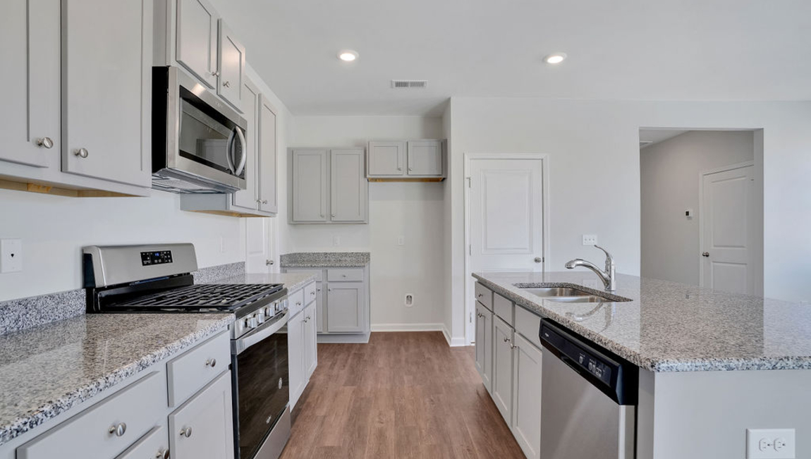 It's open concept first floor as well as a 1st floor guest suite is perfect for today's family.