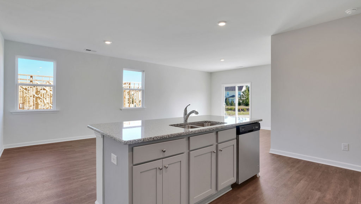 It's open concept first floor as well as a 1st floor guest suite is perfect for today's family.