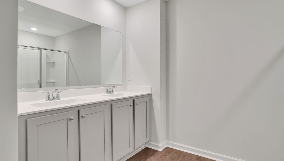 The 2nd floor offers an primary oasis with walk-in shower, dual vanity and massive walk-in closet offering everything you could have hoped for in your new home