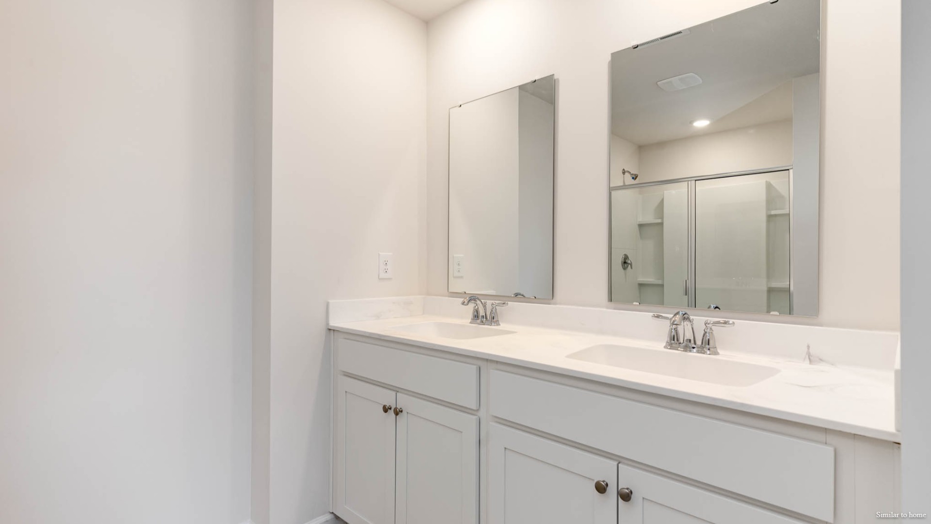 Luxury vinyl plank flooring is included throughout the main living areas of the home to handle all your beach days year-round. The owner's suite features a step-in 5-foot shower and dual vanity.