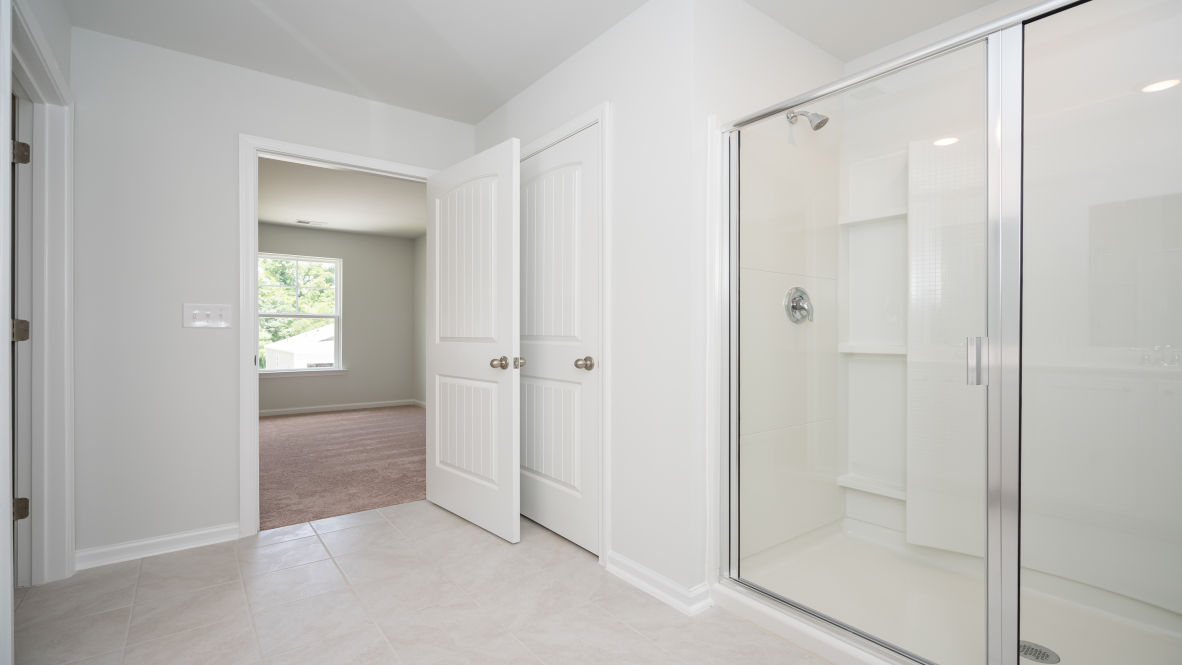 The second floor is complete with 3 additional bedrooms, a shared bathroom, storage & laundry room.