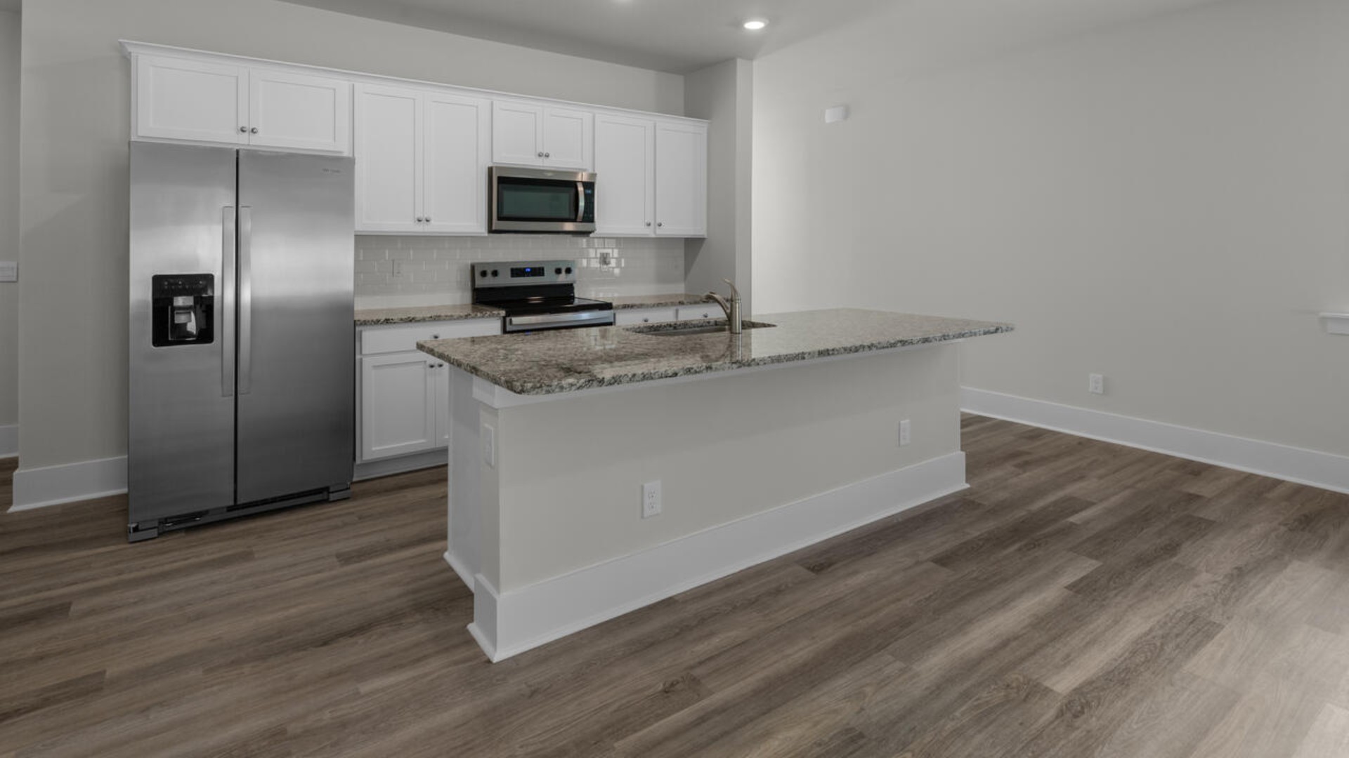 The living area is an open concept, where your kitchen, living, and dining areas blend seamlessly into a space perfect for everyday living and entertaining.