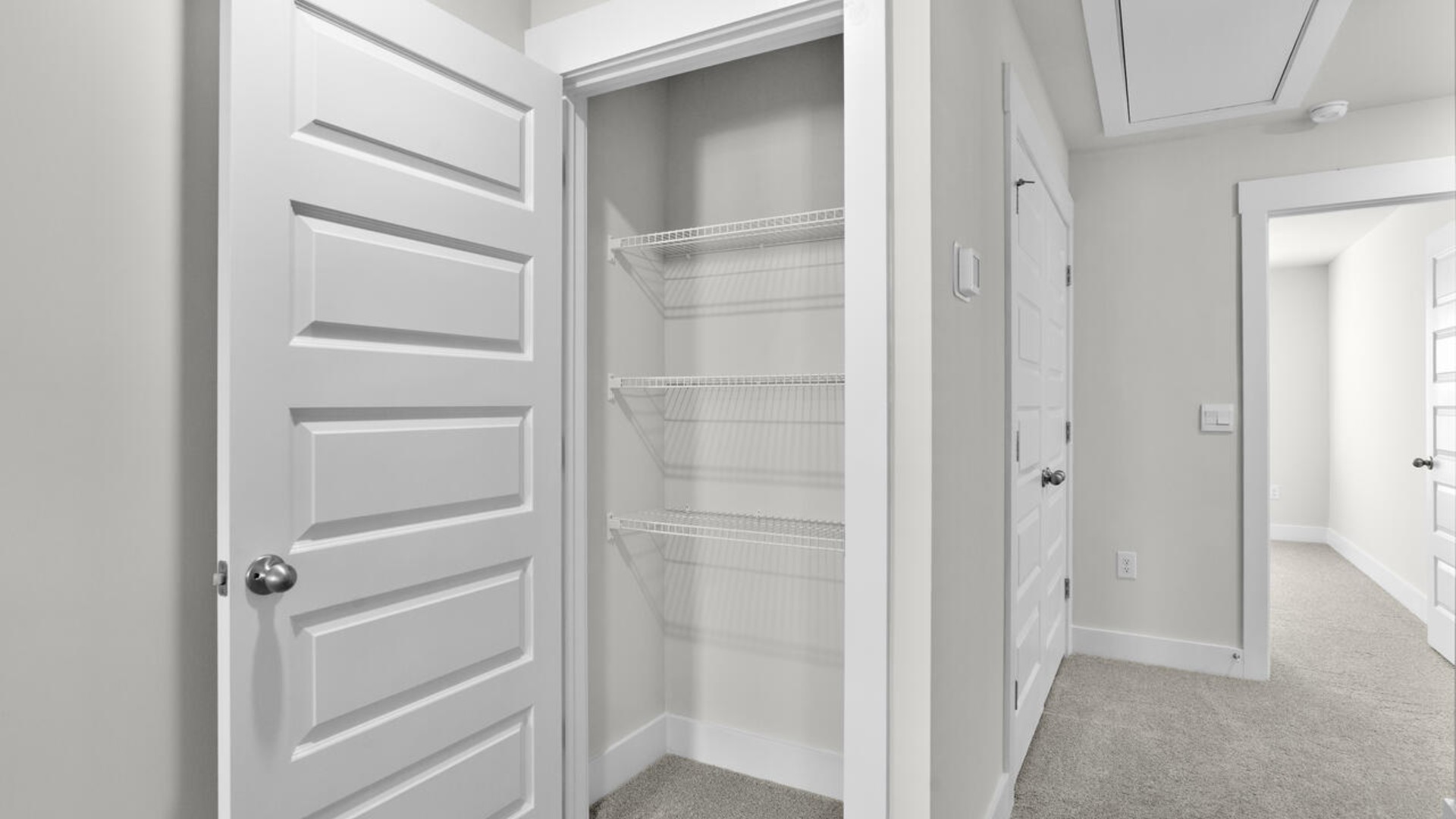 The second floor features the primary bedroom with a walk-in closet and double vanities.