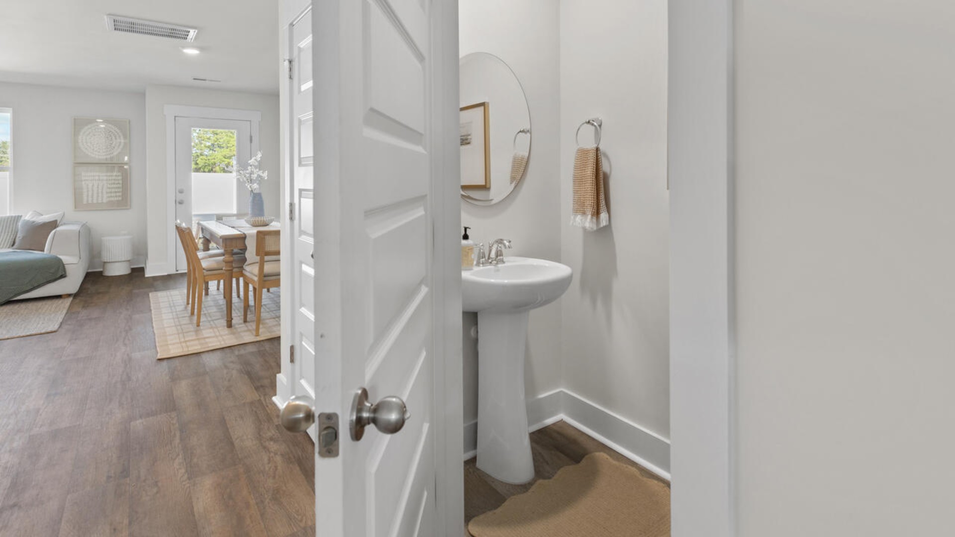 The second floor features the primary bedroom with a walk-in closet and double vanities. It also includes two additional bedrooms, a shared bathroom, and a laundry room for convenience. In every bedroom you’ll have carpeted floors and a closet in each room. Whether these rooms become bedrooms, office spaces, or other bonus rooms, there is sure to be comfort.