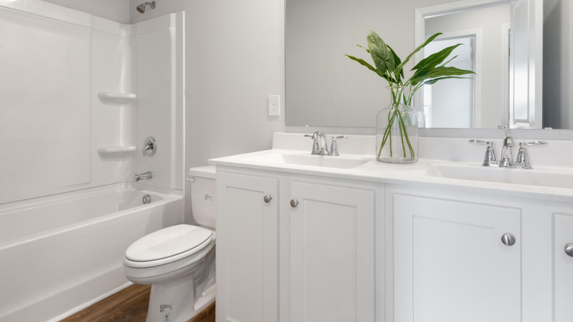 Upstairs, you'll find a generous primary suite featuring a walk-in closet, along with two additional guest bedrooms and a shared full bath, perfect for family or flexible living space. This thoughtfully designed layout provides the privacy you need with all the function you want.