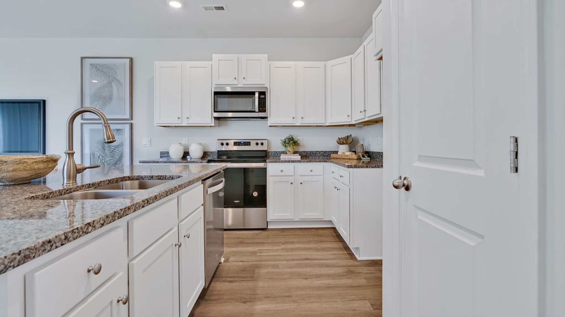 This is a 3 bedroom, 2 bath with 1,533 sq ft of living space. Enjoy a 1-car garage and a welcoming main floor that includes a spacious living area, modern kitchen, and a convenient powder room—ideal for guests and everyday use.