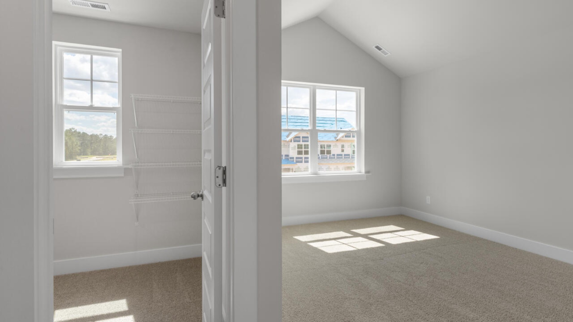 The second-floor primary bedroom is located at the front of the home and boasts a large bath and walk-in closet. There are additional 2 bedrooms, 2 full bathrooms and laundry room at the back of the home.