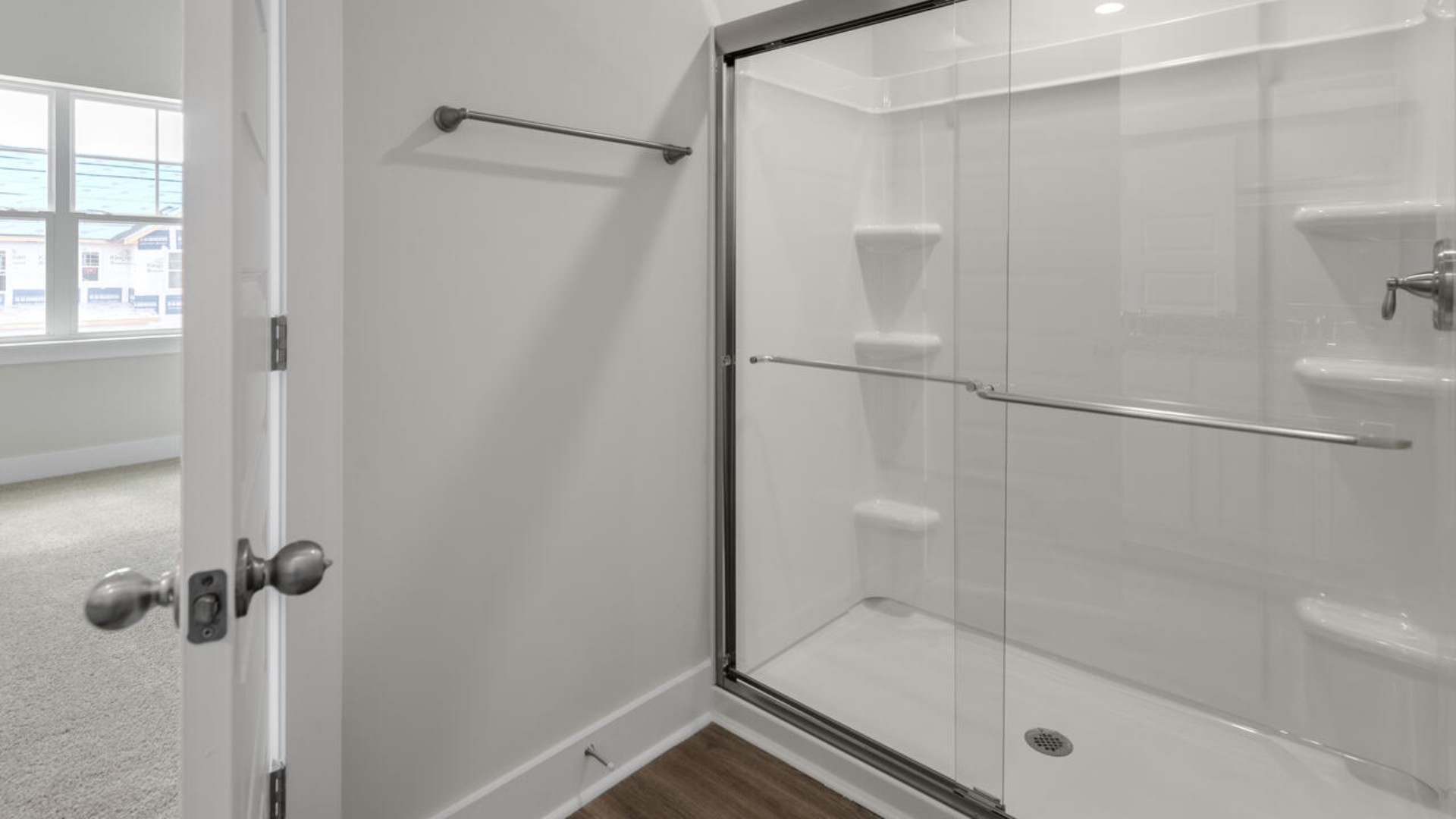 The second-floor primary bedroom is located at the front of the home and boasts a large bath and walk-in closet. There are additional 2 bedrooms, 2 full bathrooms and laundry room at the back of the home.