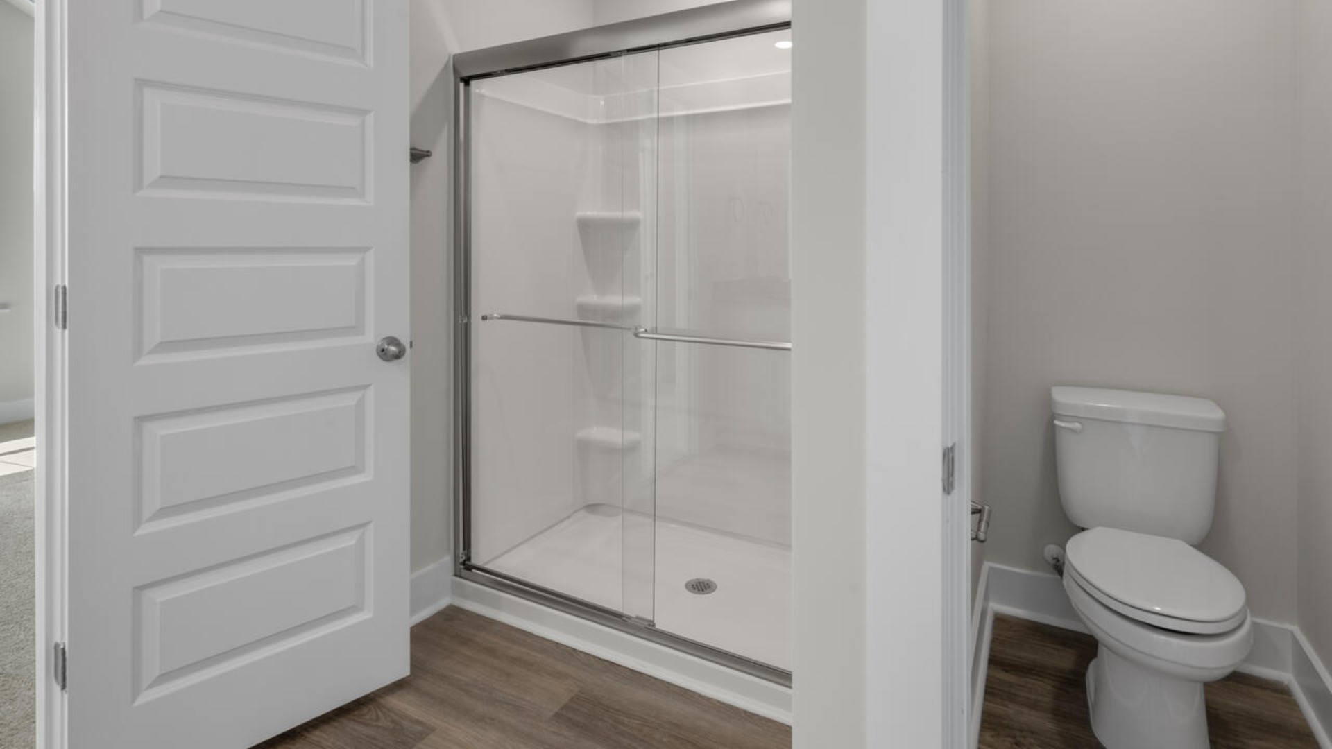 The second-floor primary bedroom is located at the front of the home and boasts a large bath and walk-in closet. There are additional 2 bedrooms, 2 full bathrooms and laundry room at the back of the home.