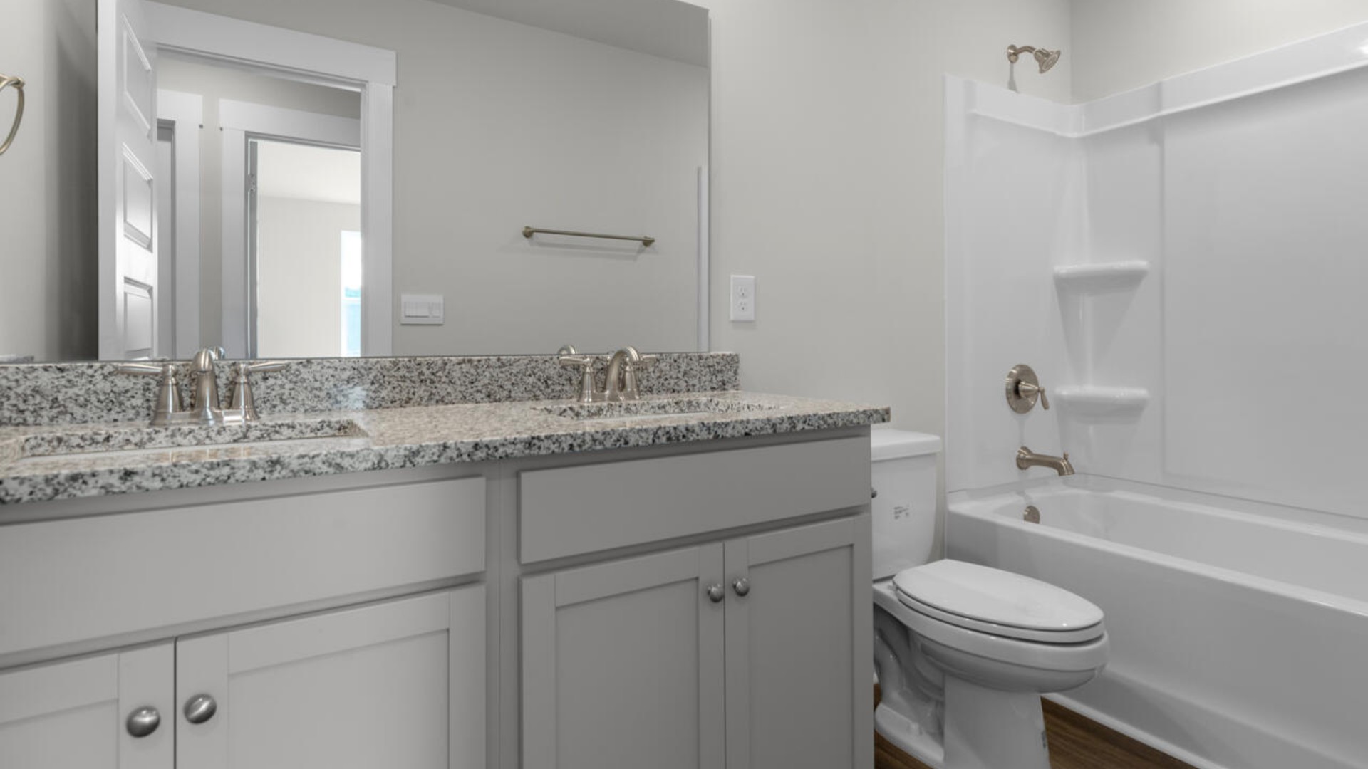 There are additional 2 bedrooms, 2 full bathrooms and laundry room at the back of the home. In every bedroom you’ll have carpeted floors and a closet in each room