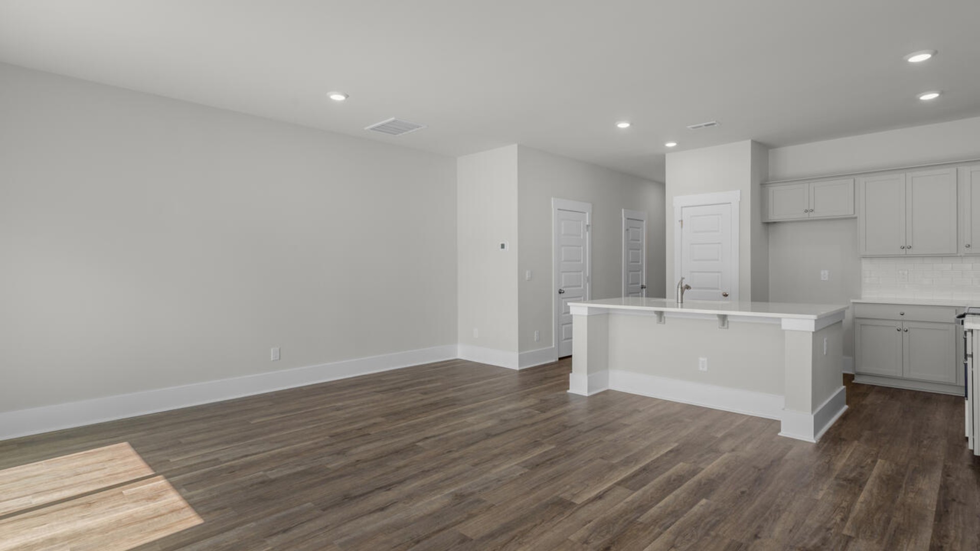 The living area is an open concept, where your kitchen, living, and dining areas blend seamlessly into a space perfect for everyday living and entertaining.