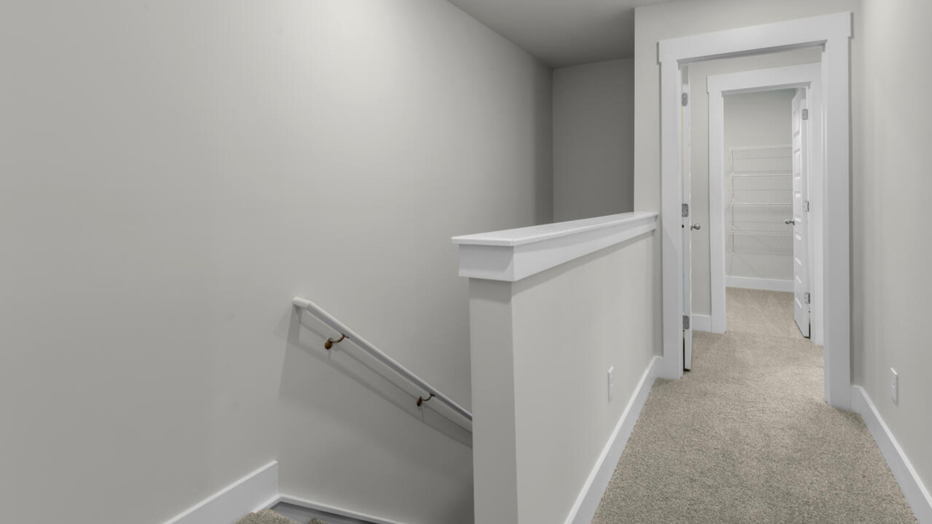 he second-floor primary bedroom is located at the front of the home and boasts a large bath and walk-in closet