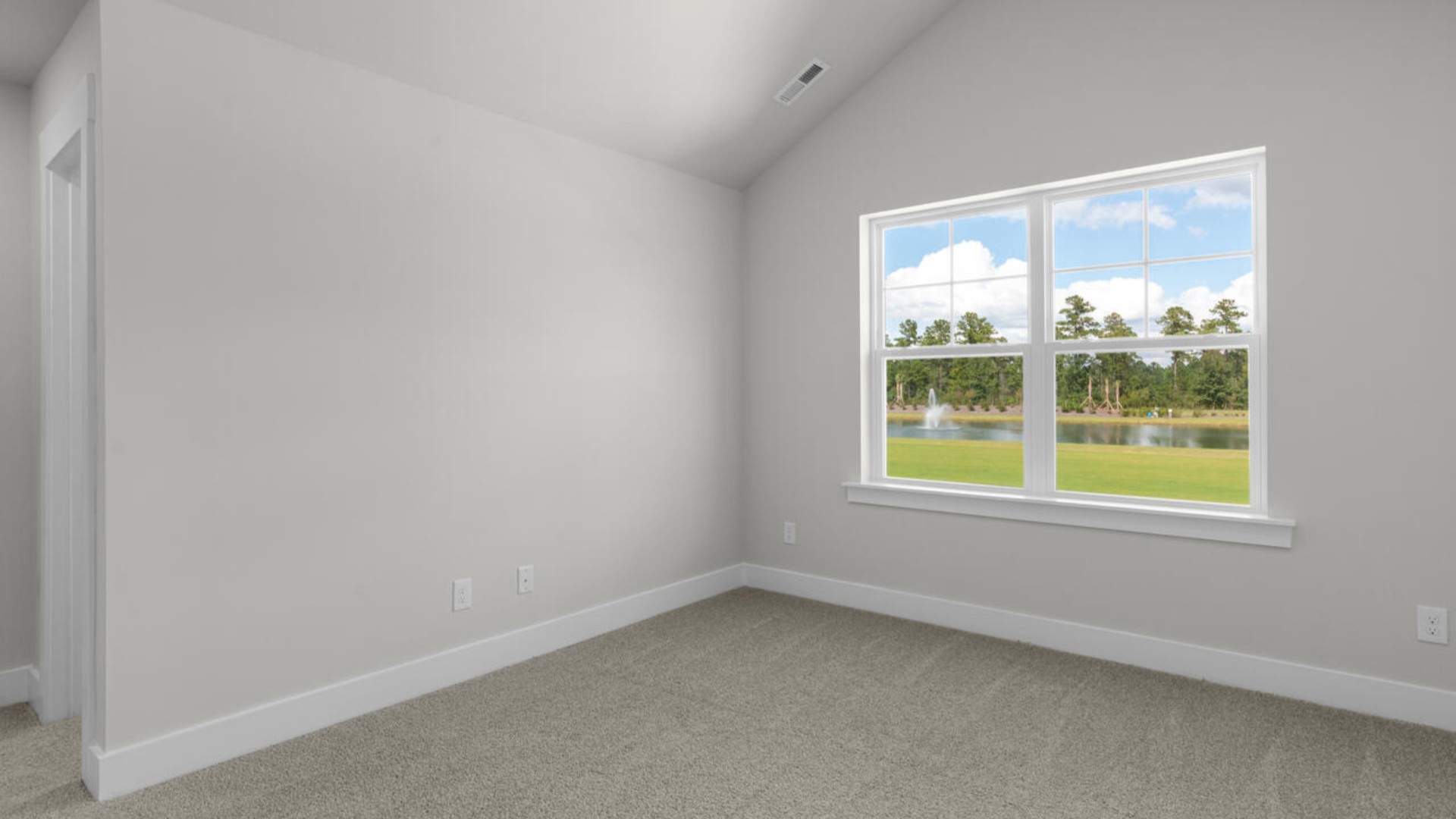 he second-floor primary bedroom is located at the front of the home and boasts a large bath and walk-in closet