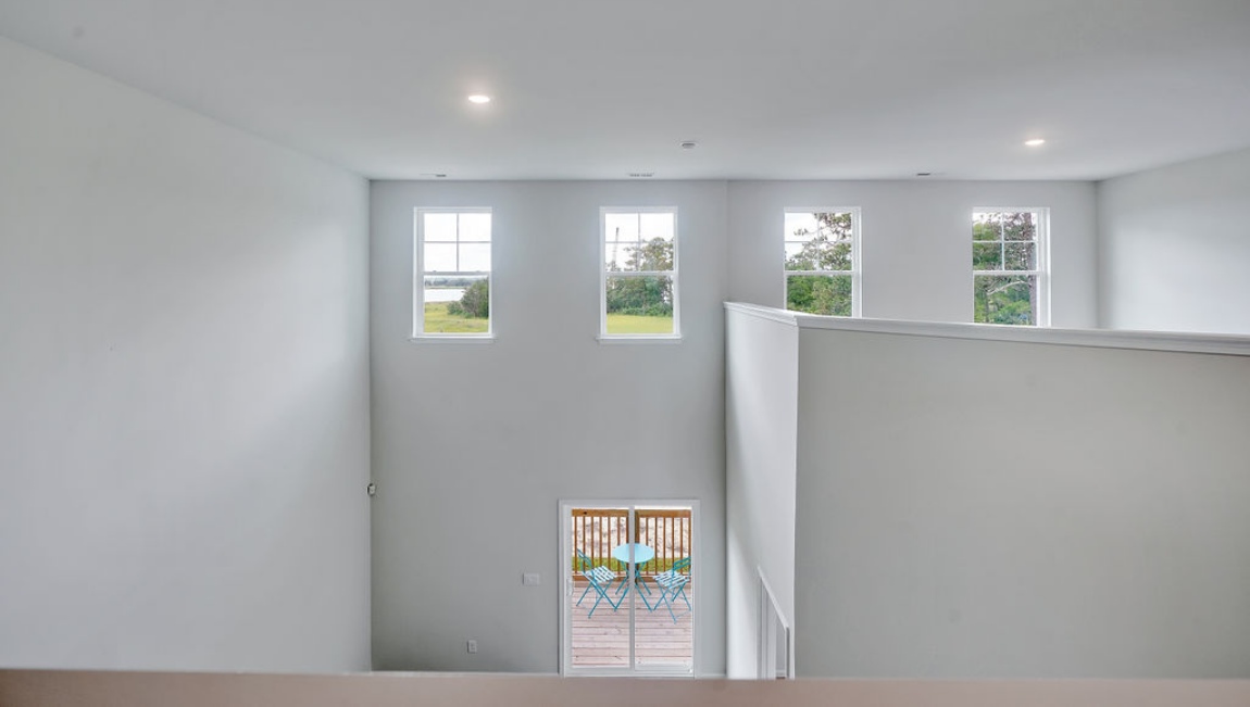 Upstairs, you'll find 2 additional bedrooms and a full bath, and a wonderful den area overlooking the living area on the main floor.