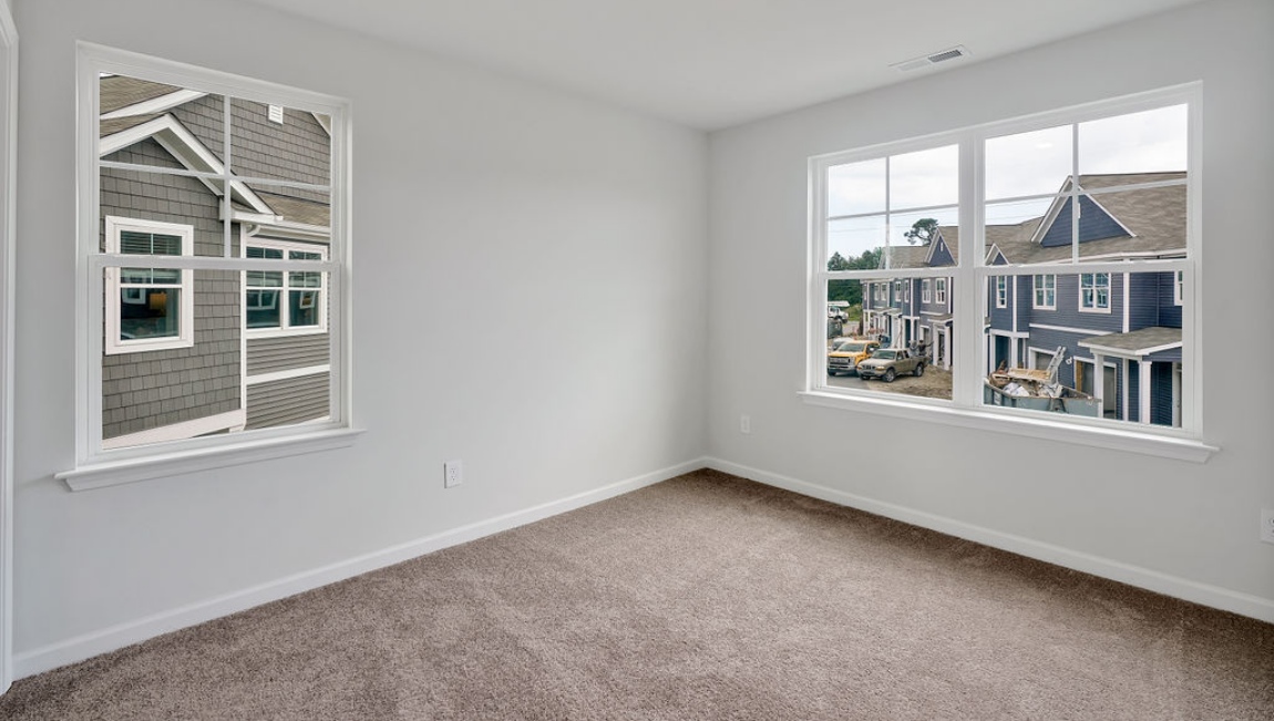 Upstairs, you'll find 2 additional bedrooms and a full bath, and a wonderful den area overlooking the living area on the main floor.