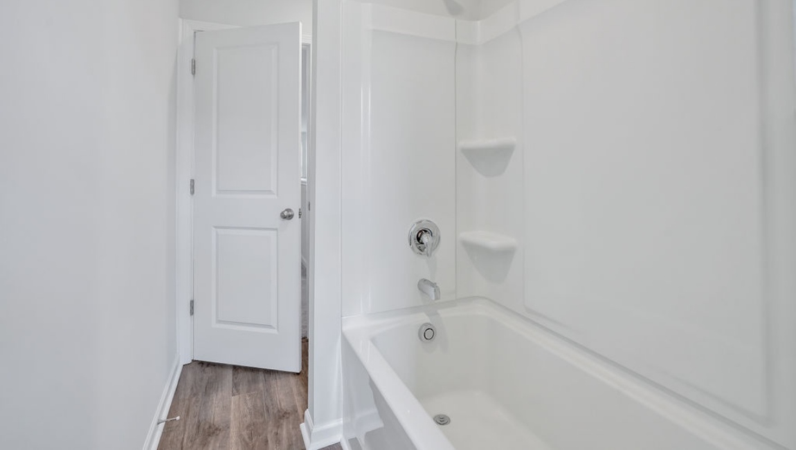 Upstairs, you'll find 2 additional bedrooms and a full bath, and a wonderful den area overlooking the living area on the main floor.