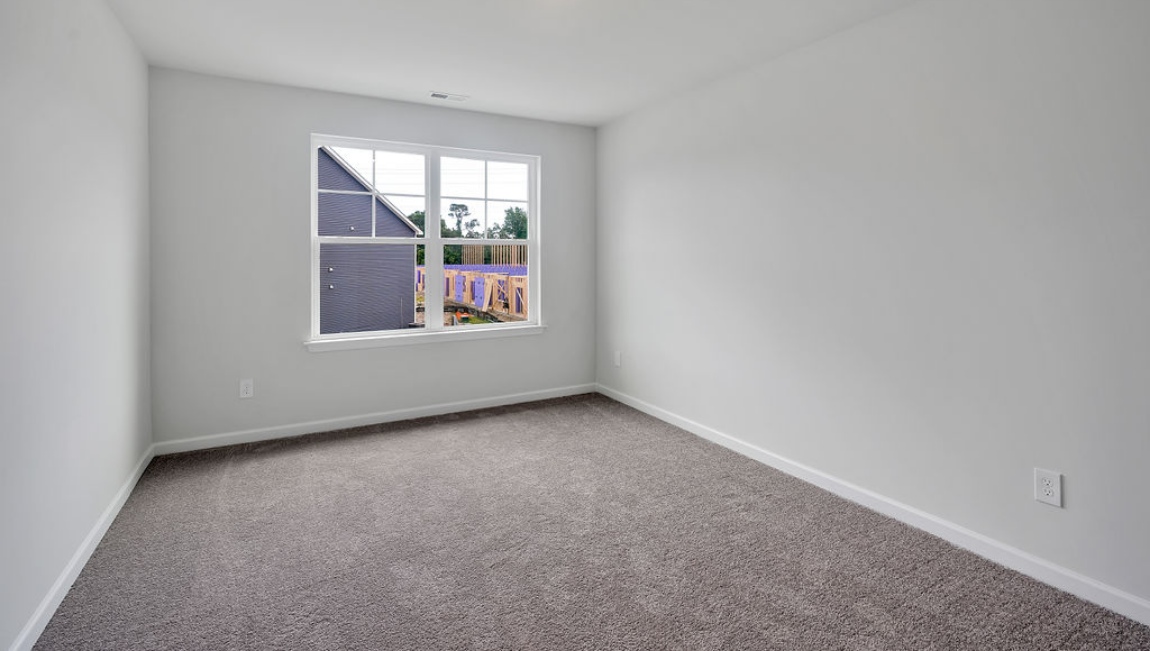 Upstairs, you'll find 2 additional bedrooms and a full bath, and a wonderful den area overlooking the living area on the main floor.