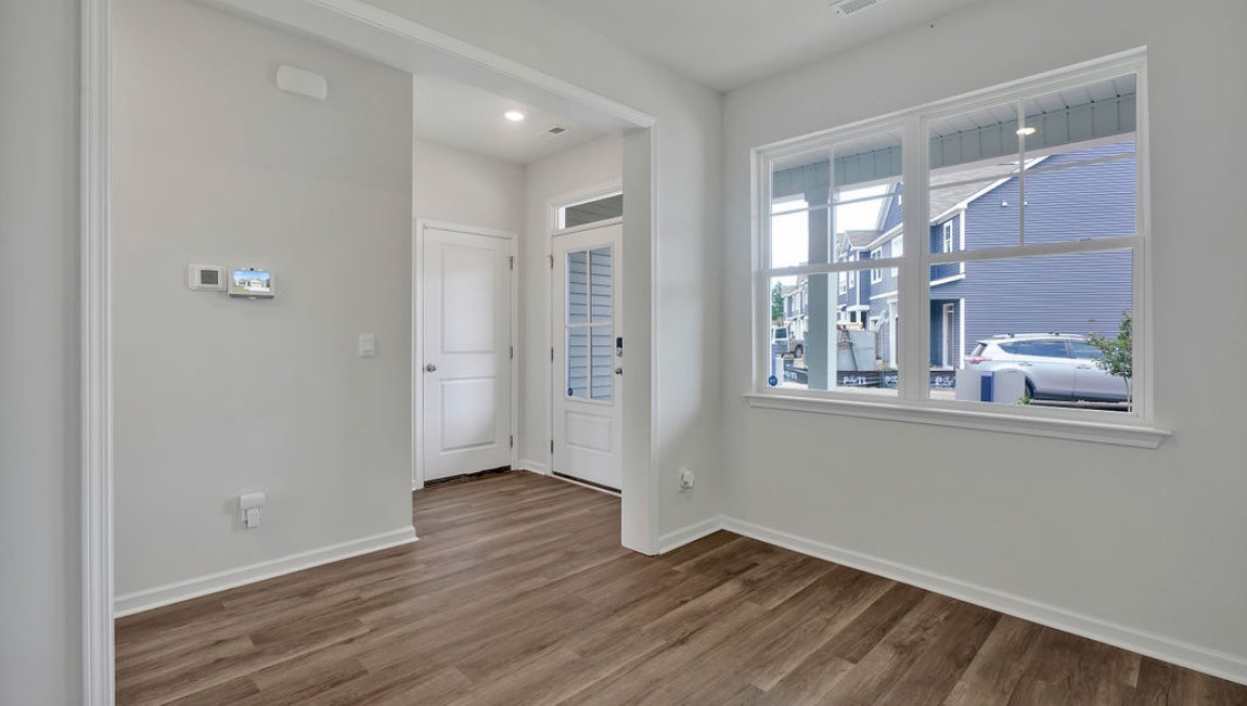 As you enter the home, you'll find a flex room which can be a great office space or even formal dining room.