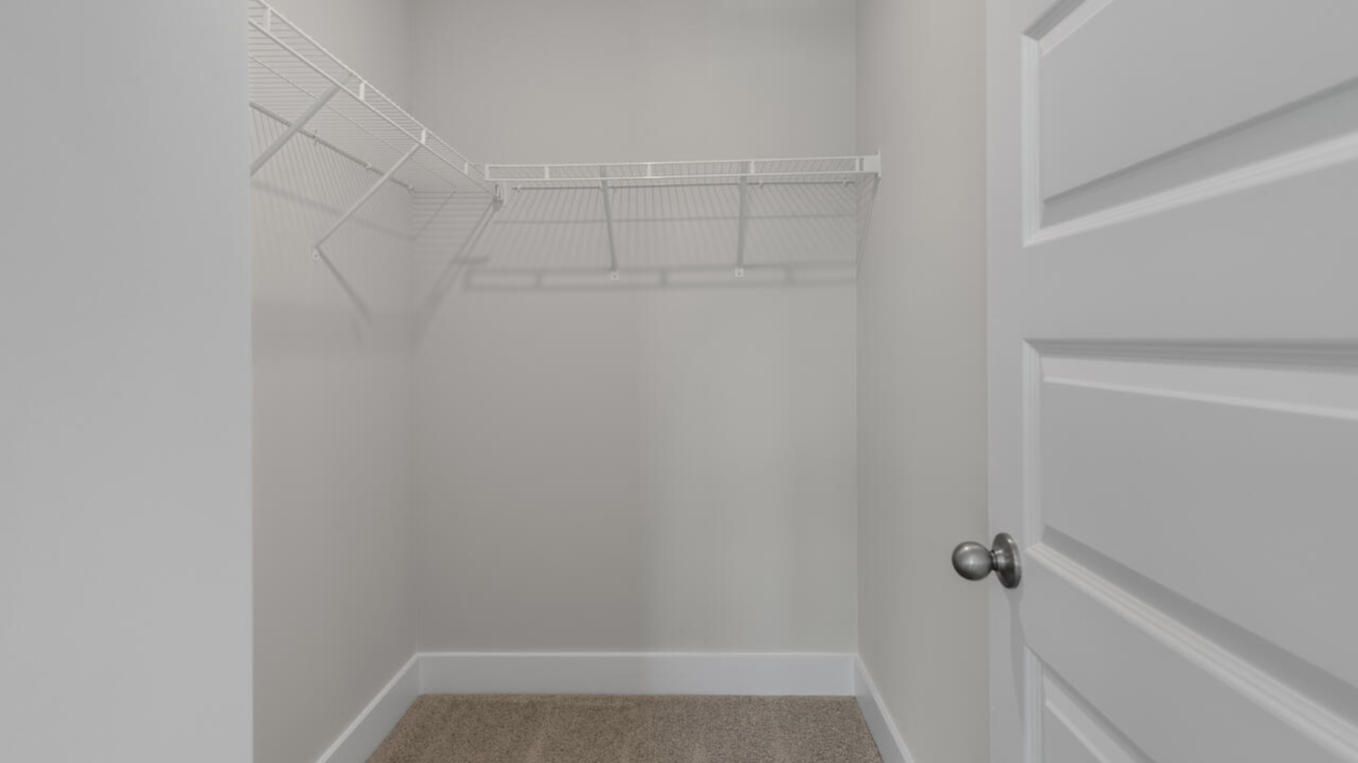 The first-floor primary bedroom boasts a large bath, double vanities and walk-in closet. On the second floor, you are greeted by a versatile loft space, laundry room, two secondary bedrooms, and a full bath.