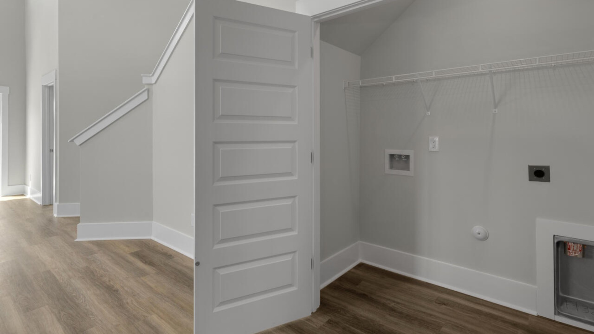 The first-floor primary bedroom boasts a large bath, double vanities and walk-in closet. On the second floor, you are greeted by a versatile loft space, laundry room, two secondary bedrooms, and a full bath.