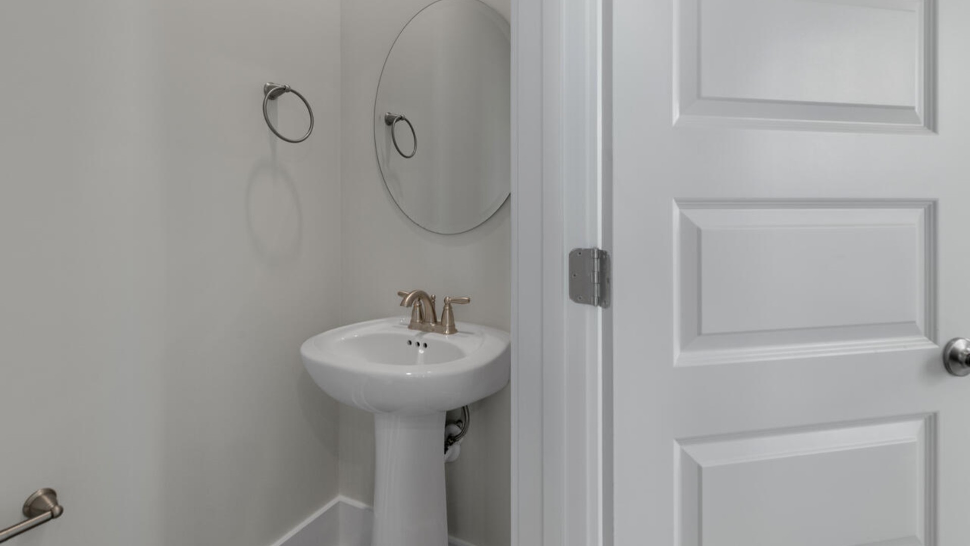 The first-floor primary bedroom boasts a large bath, double vanities and walk-in closet. On the second floor, you are greeted by a versatile loft space, laundry room, two secondary bedrooms, and a full bath.