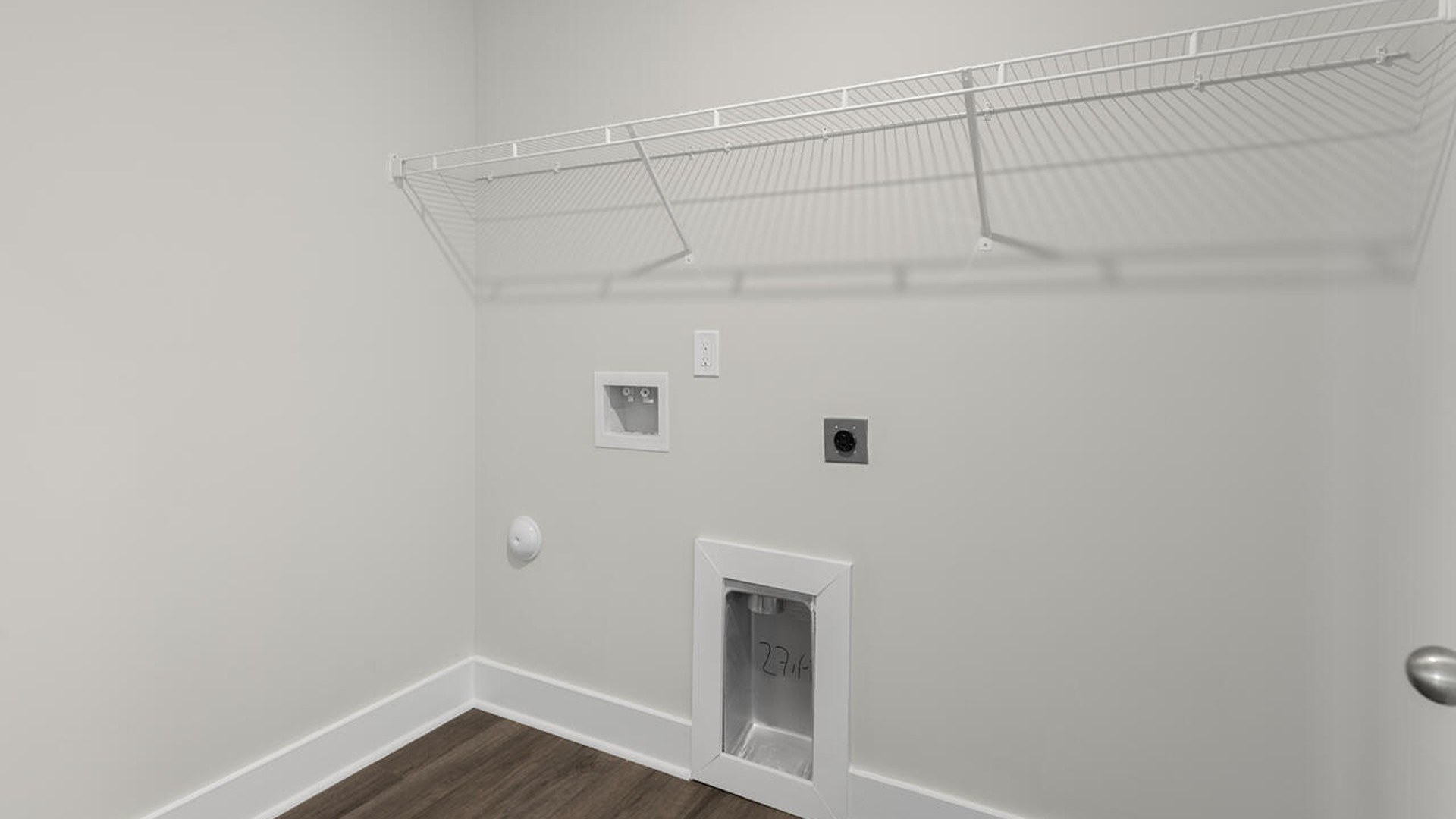 On the second floor, you are greeted by three additional bedrooms, two full bathrooms and laundry room