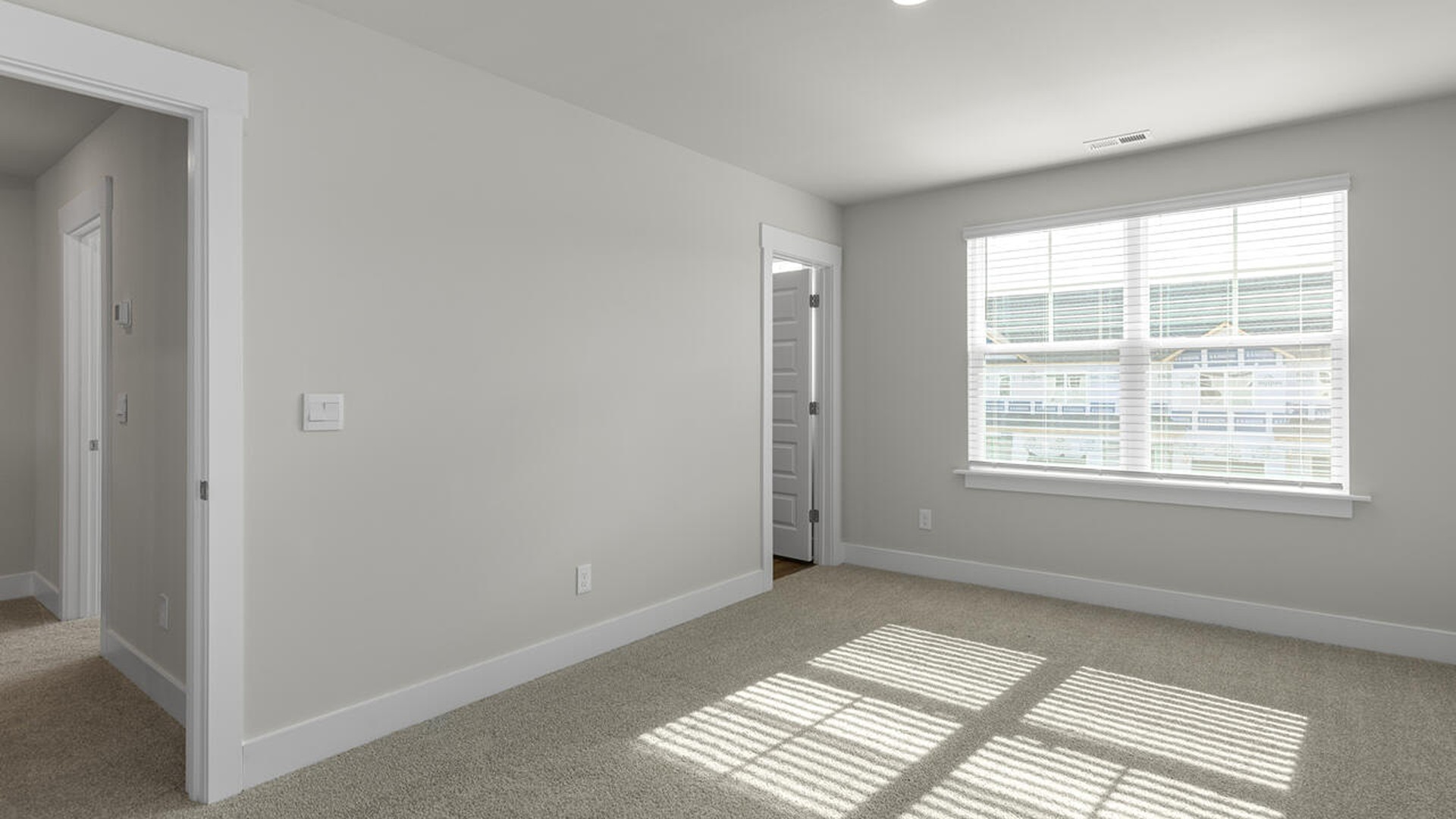 On the second floor, you are greeted by three additional bedrooms, two full bathrooms and laundry room