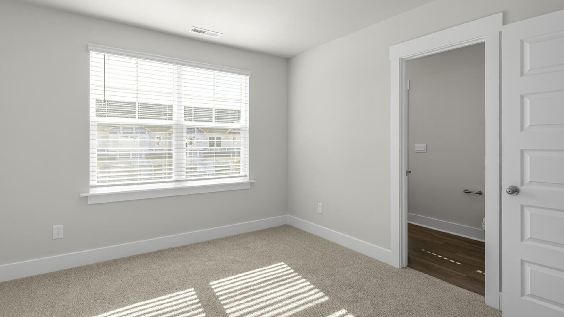 On the second floor, you are greeted by three additional bedrooms, two full bathrooms and laundry room