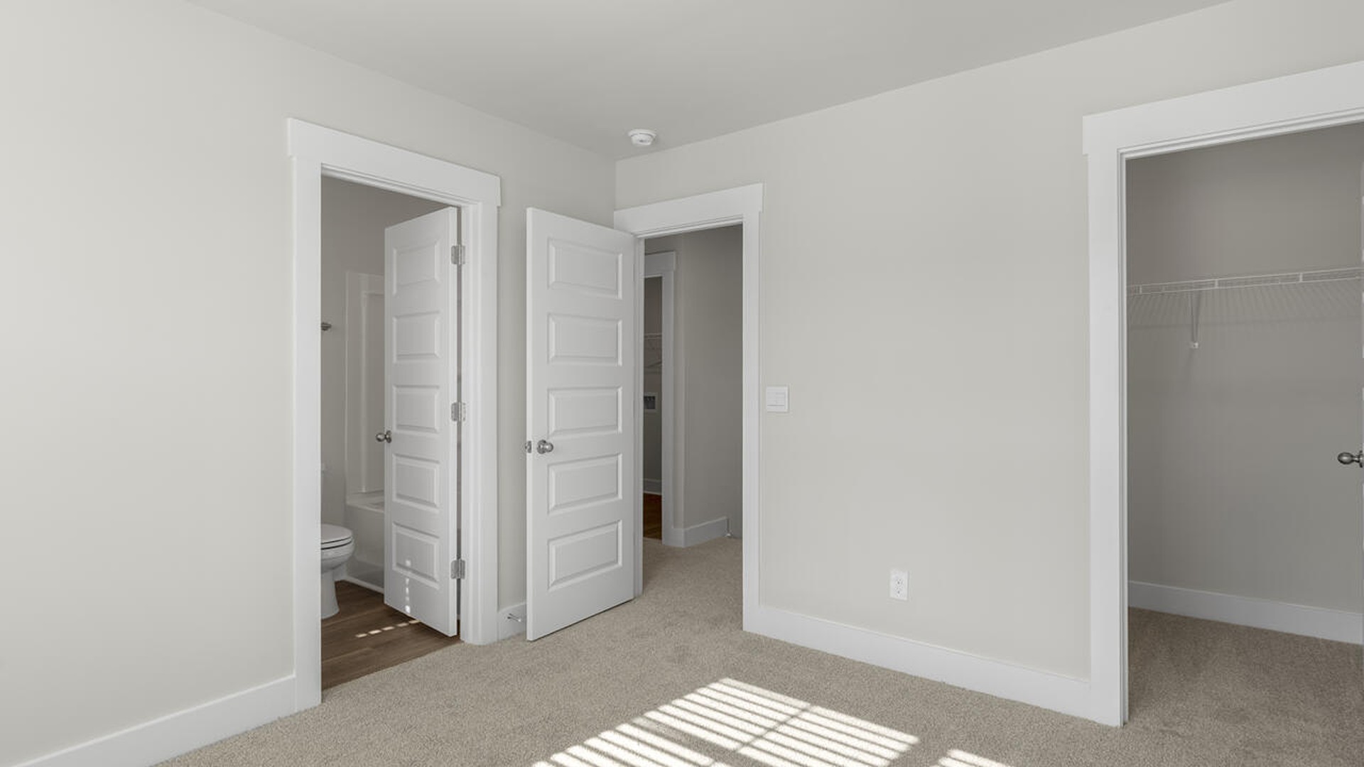 On the second floor, you are greeted by three additional bedrooms, two full bathrooms and laundry room