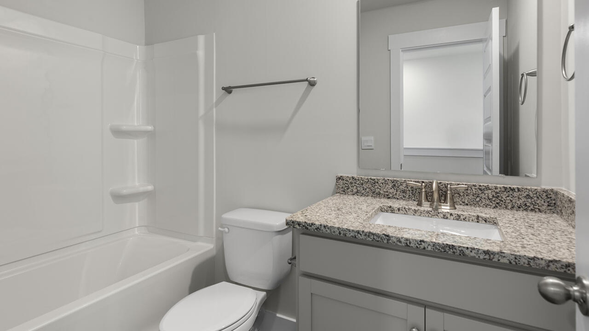 On the second floor, you are greeted by three additional bedrooms, two full bathrooms and laundry room
