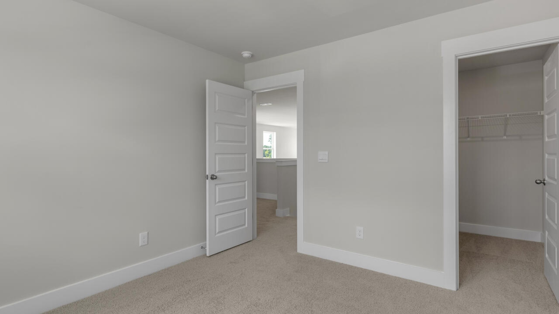 On the second floor, you are greeted by a two additional bedrooms, full bathroom, versatile loft space, and laundry room.