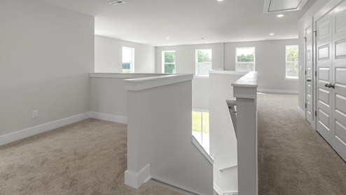 Upstairs, you'll find 2 additional bedrooms and a full jack and jill bath and can we just say ''closets galore''!