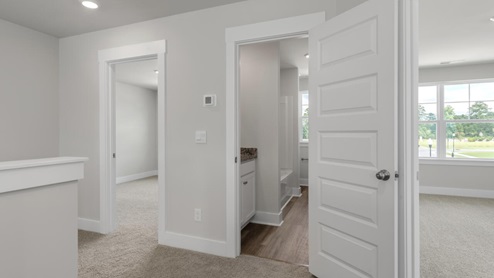Upstairs, you'll find 2 additional bedrooms and a full jack and jill bath and can we just say ''closets galore''!