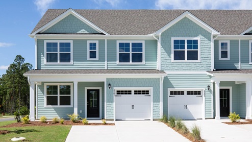 The Marion floorplan features an inviting covered front porch that opens into a formal dining room. The open concept living space is anchored by a spacious kitchen with granite countertops, stainless steel appliances and a large island that overlooks your family and dining room. Ideal for entertaining guests or enjoying family time while preparing meals.