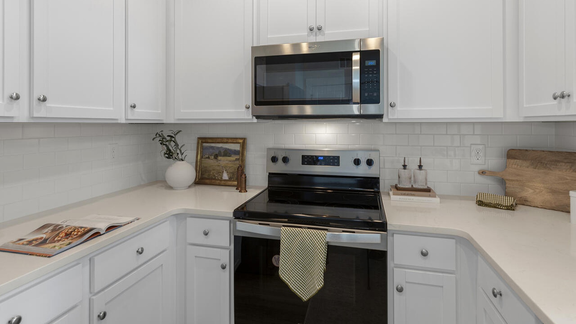 The Marion floorplan features an inviting covered front porch that opens into a formal dining room. The open concept living space is anchored by a spacious kitchen with granite countertops, stainless steel appliances and a large island that overlooks your family and dining room. Ideal for entertaining guests or enjoying family time while preparing meals.