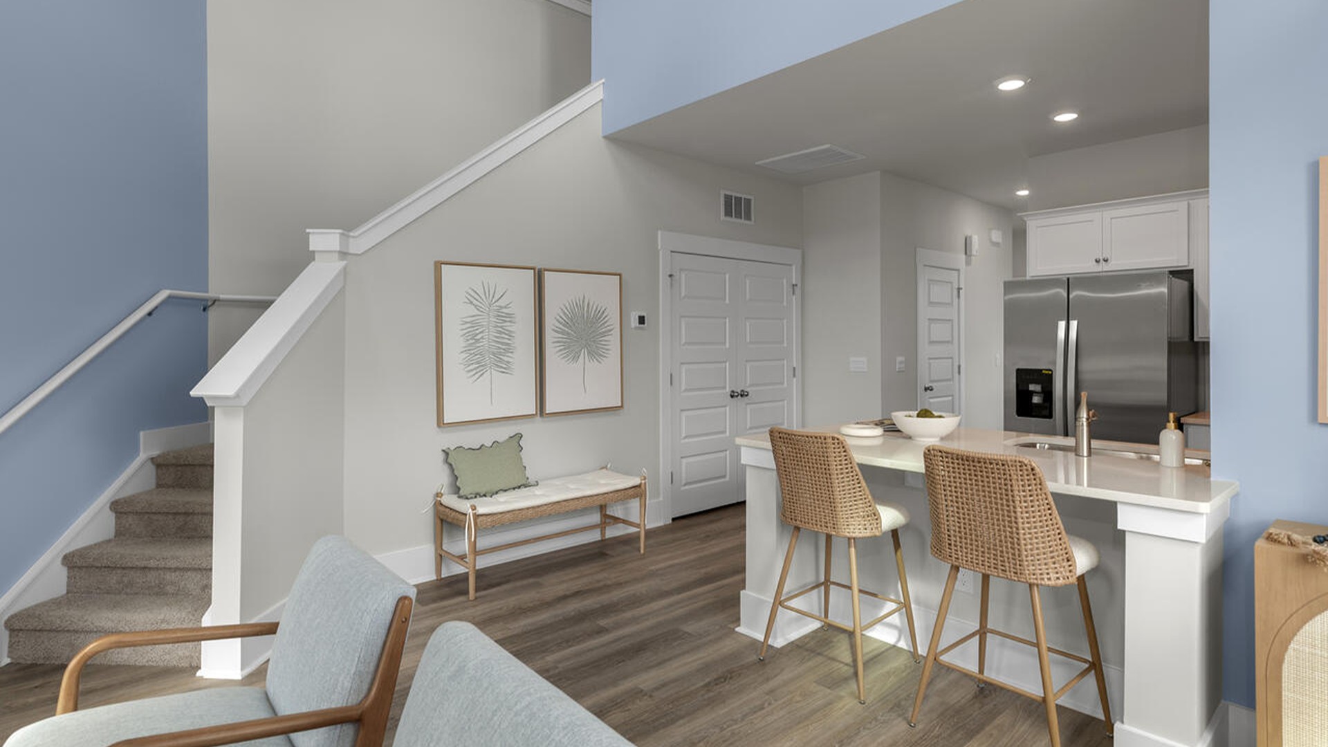 The Marion floorplan features an inviting covered front porch that opens into a formal dining room. The open concept living space is anchored by a spacious kitchen with granite countertops, stainless steel appliances and a large island that overlooks your family and dining room. Ideal for entertaining guests or enjoying family time while preparing meals.