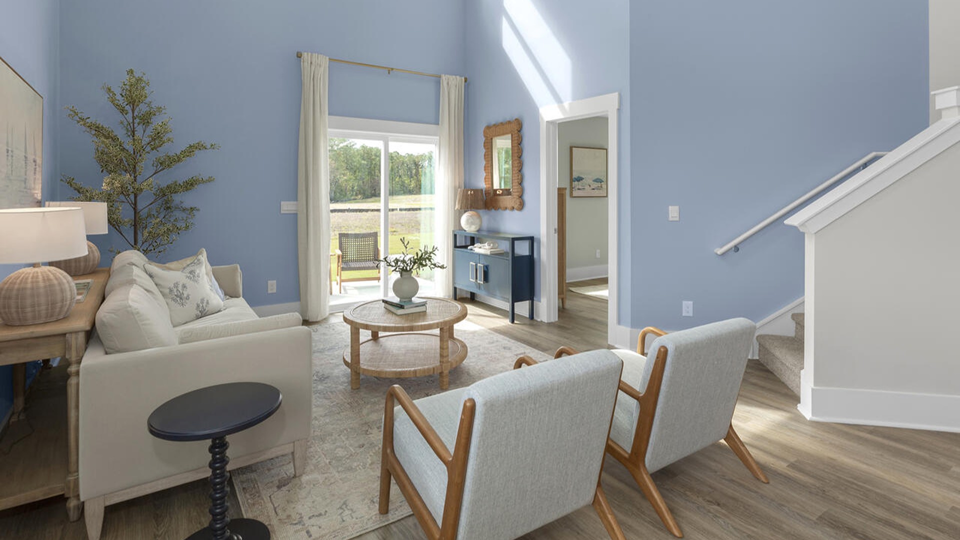 The Marion floorplan features an inviting covered front porch that opens into a formal dining room. The open concept living space is anchored by a spacious kitchen with granite countertops, stainless steel appliances and a large island that overlooks your family and dining room. Ideal for entertaining guests or enjoying family time while preparing meals.