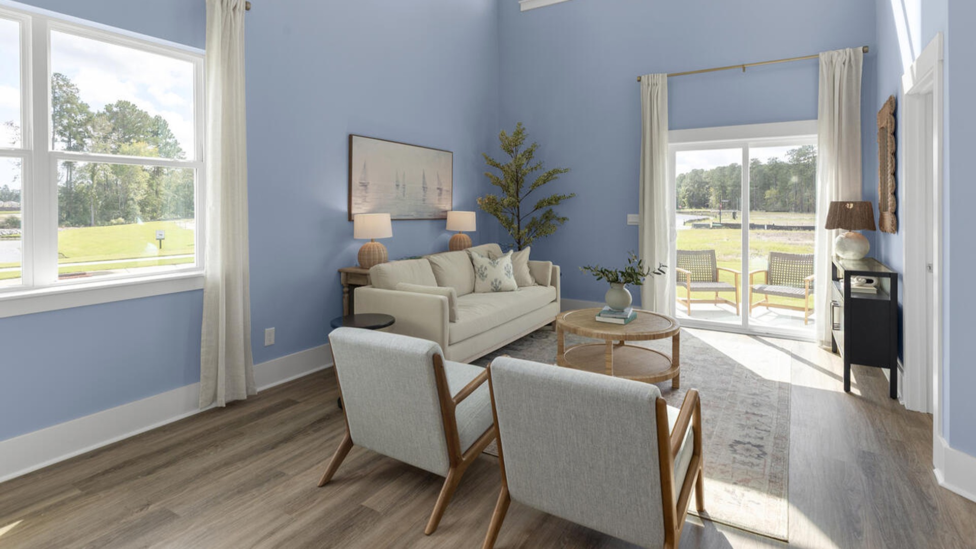 The Marion floorplan features an inviting covered front porch that opens into a formal dining room. The open concept living space is anchored by a spacious kitchen with granite countertops, stainless steel appliances and a large island that overlooks your family and dining room. Ideal for entertaining guests or enjoying family time while preparing meals.