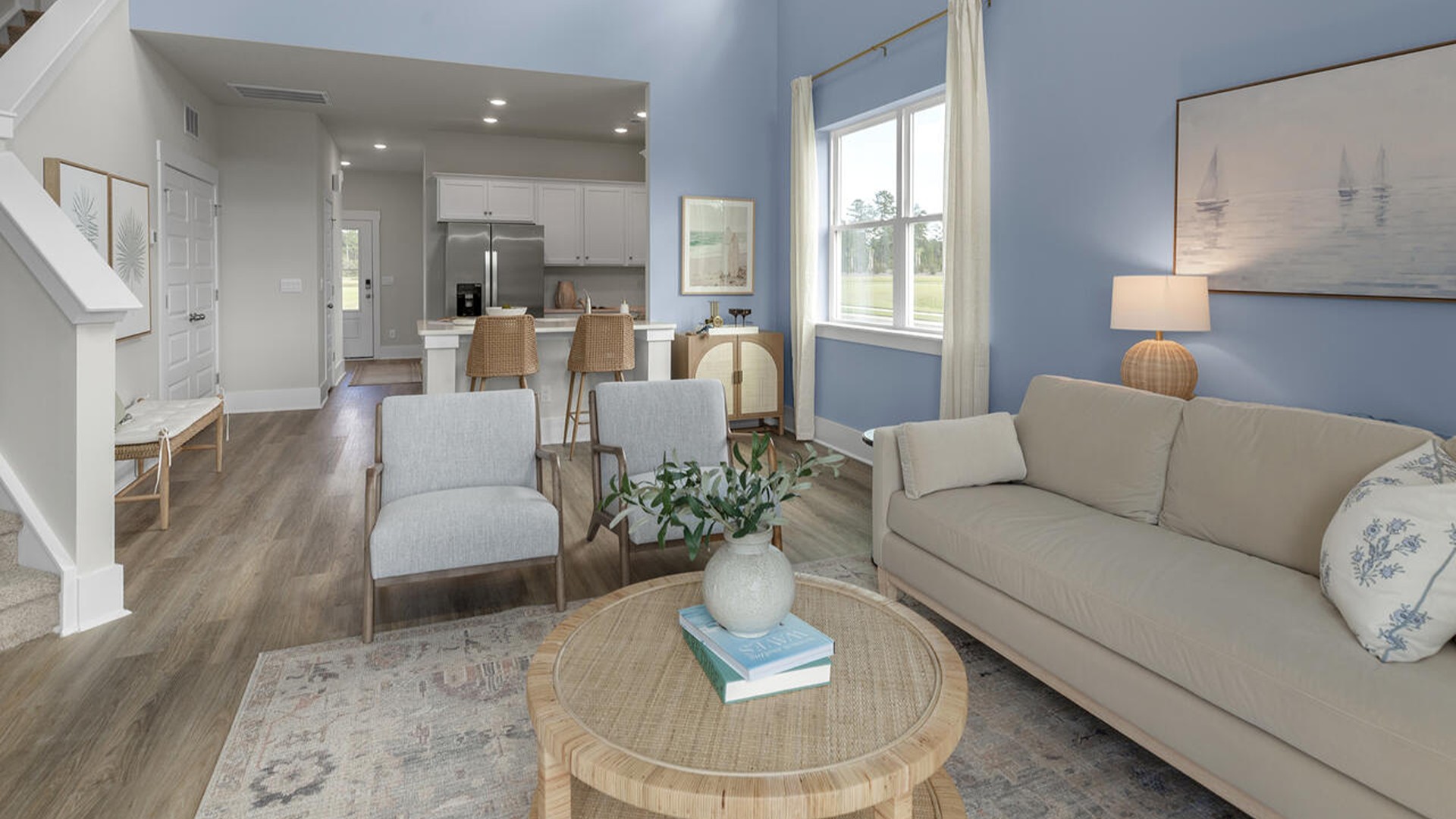 The Marion floorplan features an inviting covered front porch that opens into a formal dining room. The open concept living space is anchored by a spacious kitchen with granite countertops, stainless steel appliances and a large island that overlooks your family and dining room. Ideal for entertaining guests or enjoying family time while preparing meals.